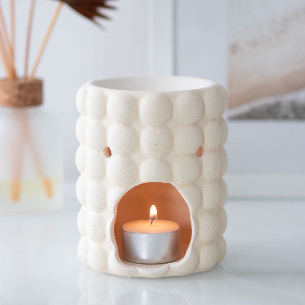 Quemador de cera crema con burbujas