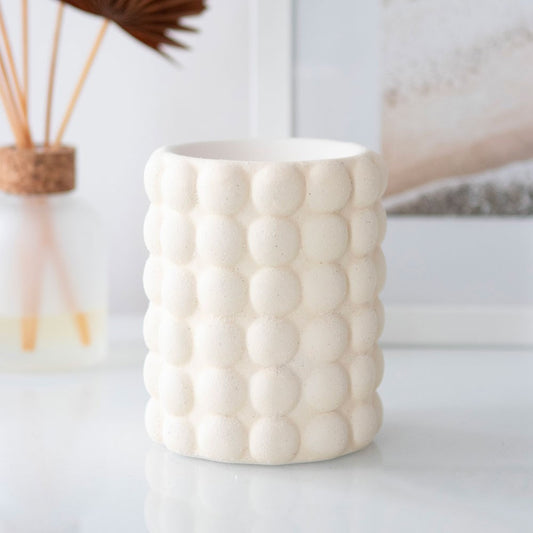 Quemador de cera crema con burbujas